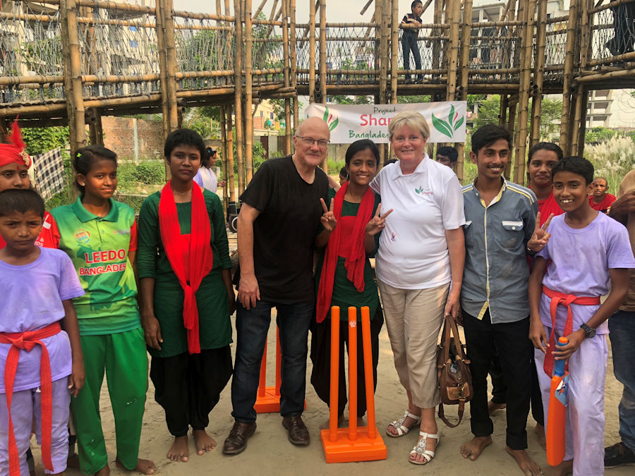 Mike Sherriff and Anne Main MP with children from LEEDO