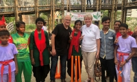 Mike Sherriff and Anne Main MP with children from LEEDO